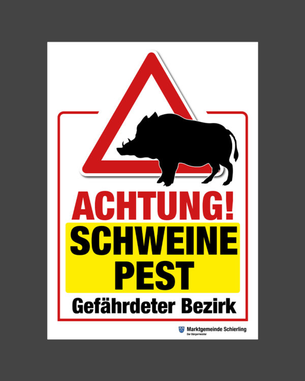 Hinweisschild Achtung Schweinepest. Gefährdeter Bezirk.